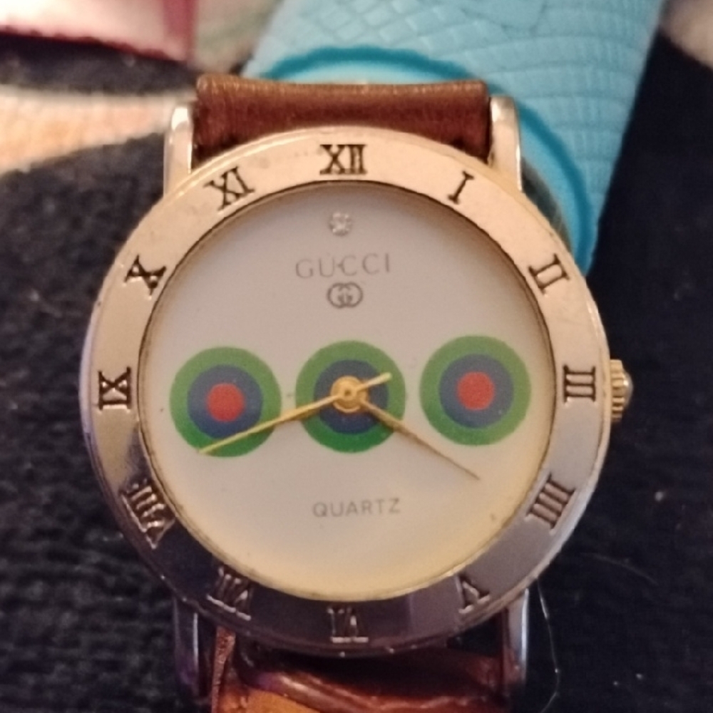Gucci Roman Numeral Watch with Leather Strap